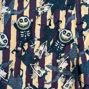 LuLaRoe Nightmare Before Christmas Themed Leggings - blueish black, tan, purple